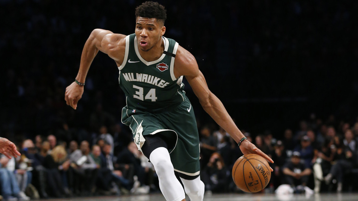 Giannis Antetokounmpo drives to the basket
